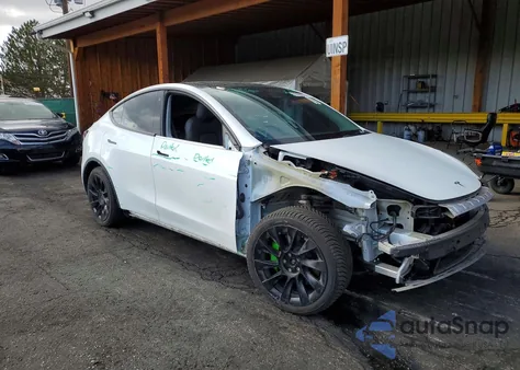 2022 Tesla Model Y из США, поврежденный, VIN 7SAYGDEEXNF401626